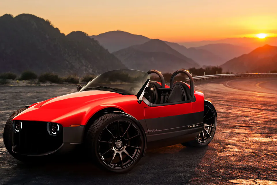Red Vanderhall Santarosa at a mountain turnout at sunset