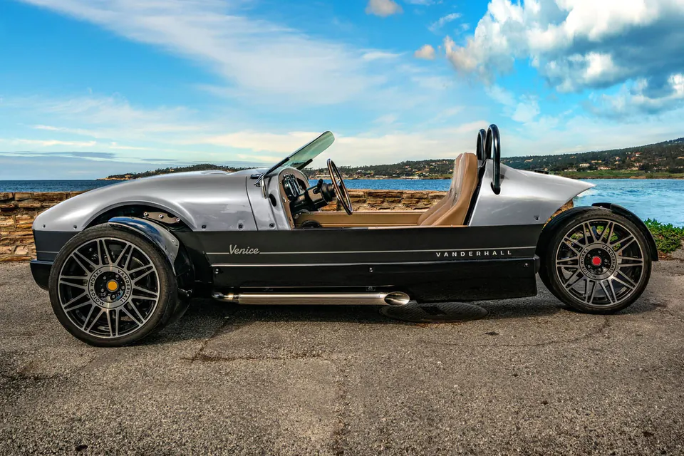 Silver Vanderhall Venice side profile by the sea